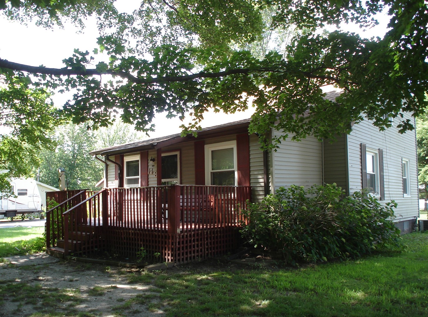 148 Wayne Road Rochelle, IL 61068 - Photo 1 of 17 a view of a house with a yard