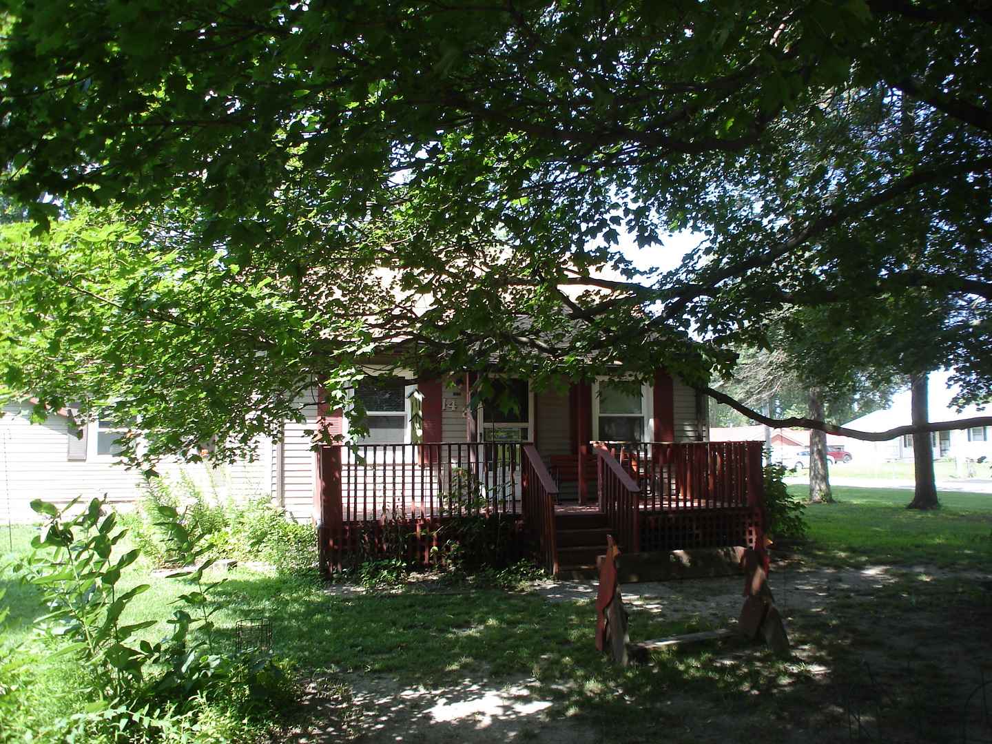 148 Wayne Road Rochelle, IL 61068 - Photo 4 of 17 a house view with a sitting space garden