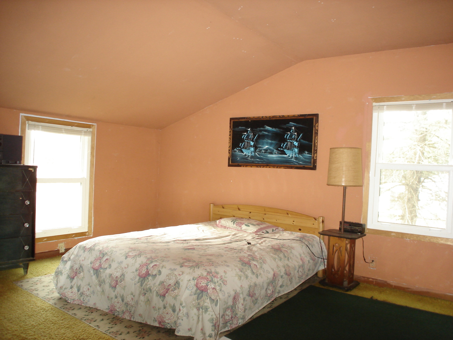 148 Wayne Road Rochelle, IL 61068 - Photo 9 of 17 a bedroom with a bed and a window