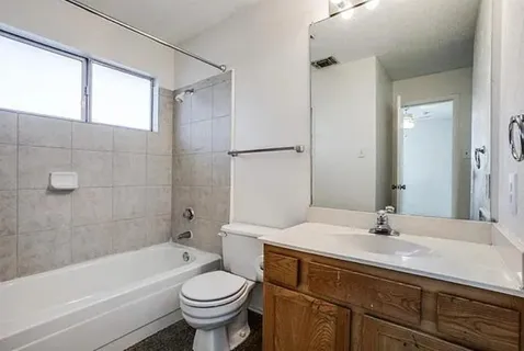 a front view of a house with a garage