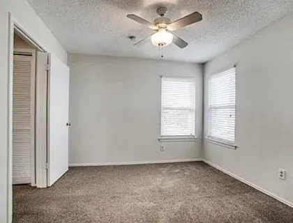 a view of a room that has a window in it