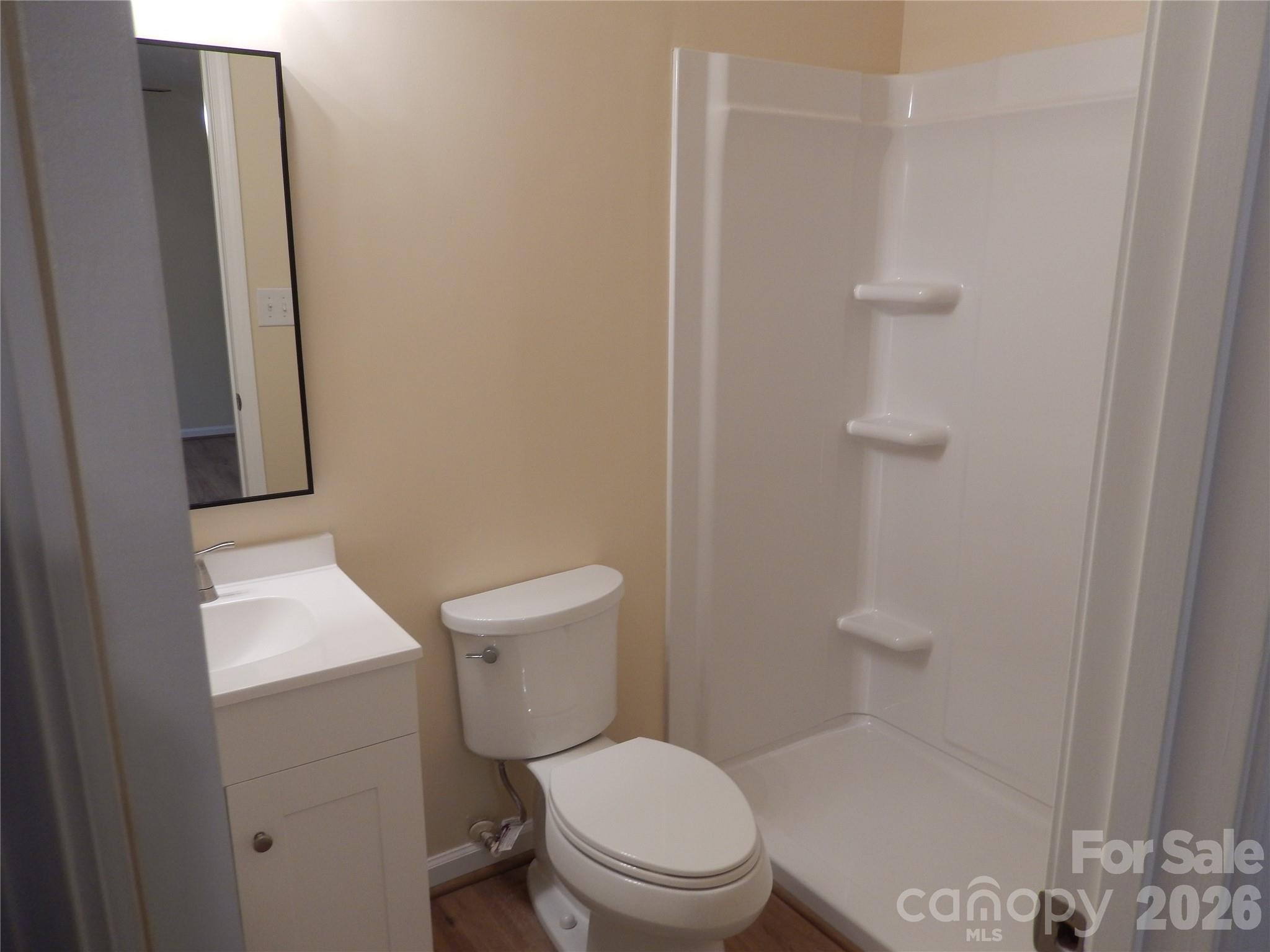 547 Brent Road Raleigh, NC 27606 - Photo 12 of 15 a white toilet sitting next to a white sink