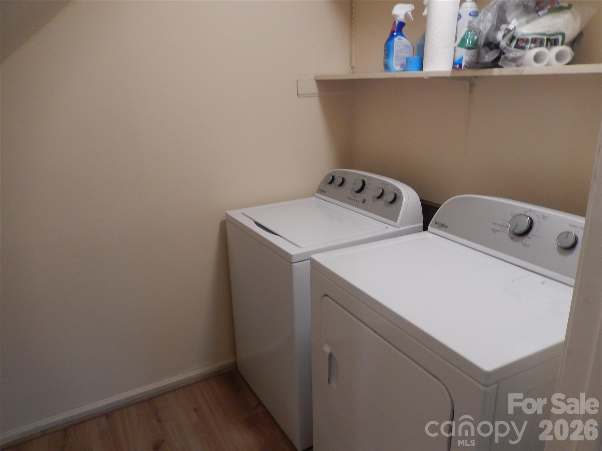 547 Brent Road Raleigh, NC 27606 - Photo 7 of 15 a utility room with dryer and washer