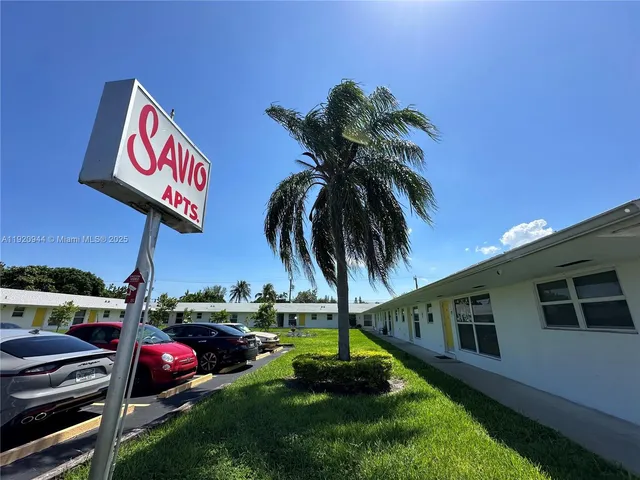 a childrens park with lots of swings and slides