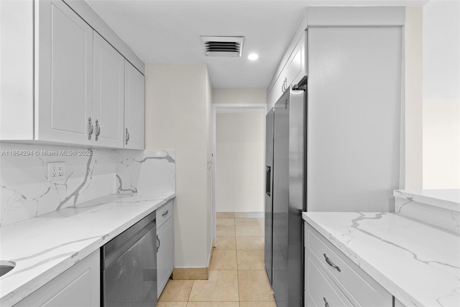 3301 Northeast 5th Avenue, Unit 1018 Miami, FL 33137 - Photo 17 of 24 a bathroom with a sink and a mirror