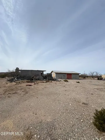 a view of a car in front of a house