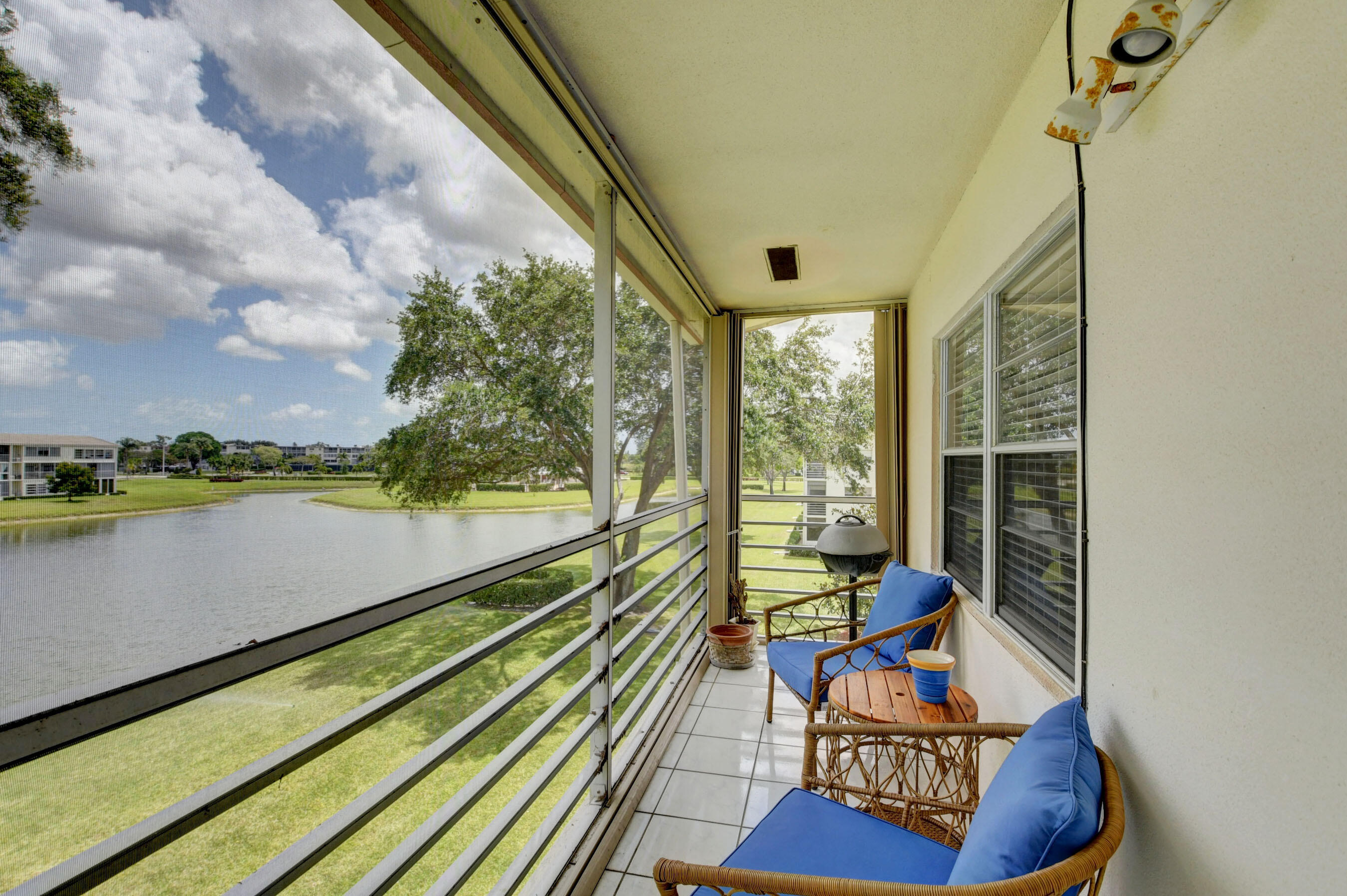 249 Preston F Boca Raton, FL 33434 - Photo 22 of 51 Screened Patio w/Lake View