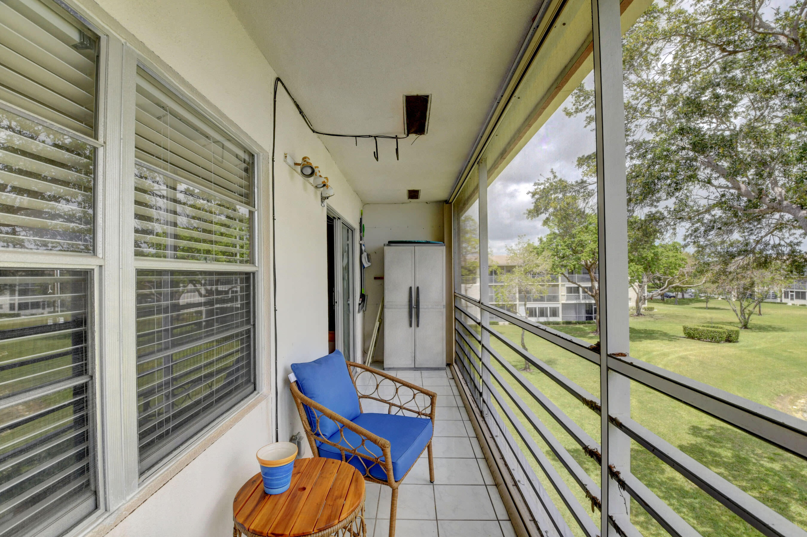 249 Preston F Boca Raton, FL 33434 - Photo 23 of 51 Screened Patio w/Lake View