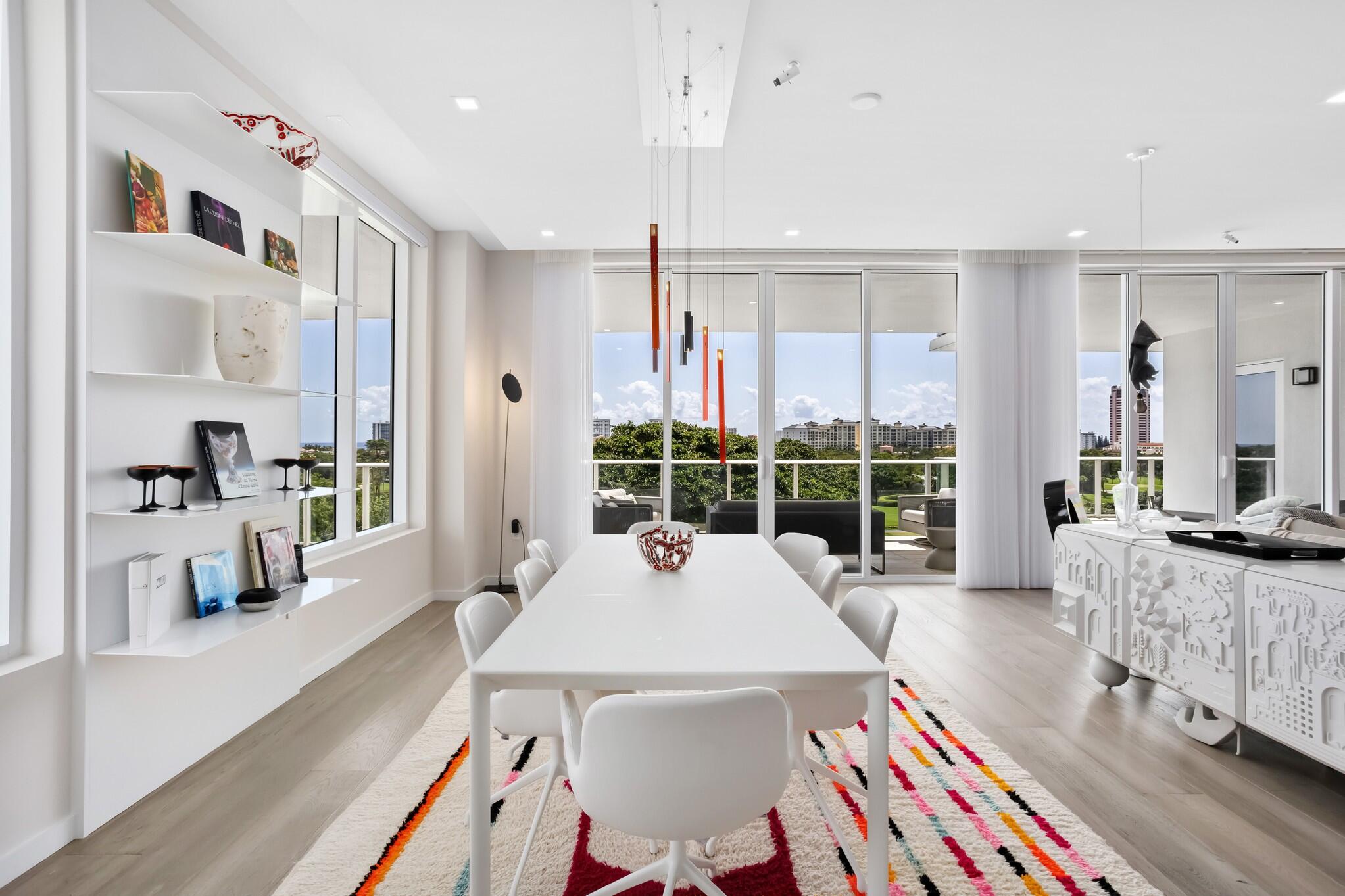 200 Southeast Mizner Boulevard, Unit 717 Boca Raton, FL 33432 - Photo 16 of 66 a living room with furniture and a large window