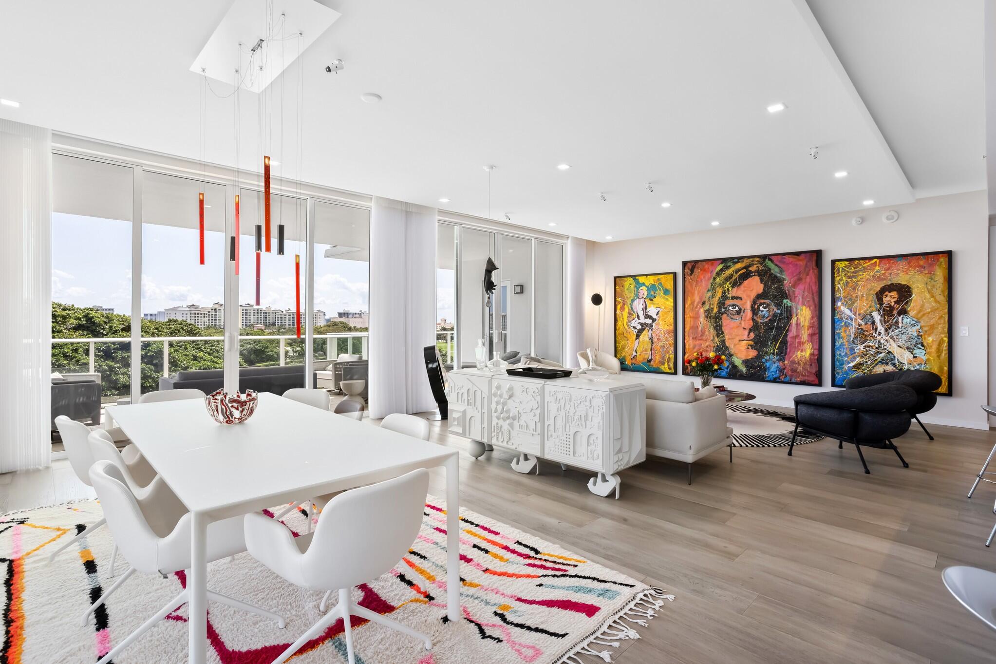 200 Southeast Mizner Boulevard, Unit 717 Boca Raton, FL 33432 - Photo 3 of 66 a living room with furniture and large window