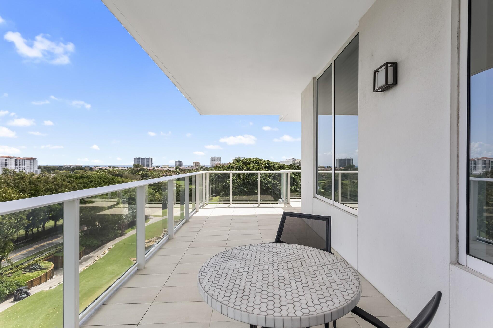 200 Southeast Mizner Boulevard, Unit 717 Boca Raton, FL 33432 - Photo 35 of 66 a view of a balcony with chairs