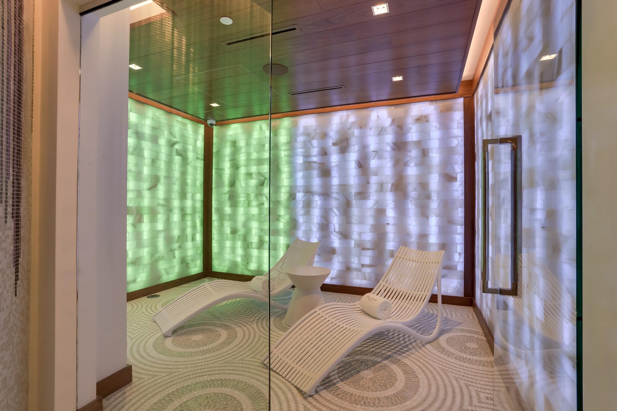 200 Southeast Mizner Boulevard, Unit 717 Boca Raton, FL 33432 - Photo 51 of 66 a bed room with a bed and a window