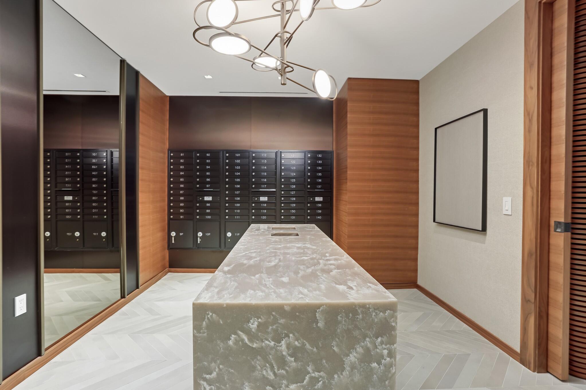 200 Southeast Mizner Boulevard, Unit 717 Boca Raton, FL 33432 - Photo 58 of 66 a view of a hallway with a elevator