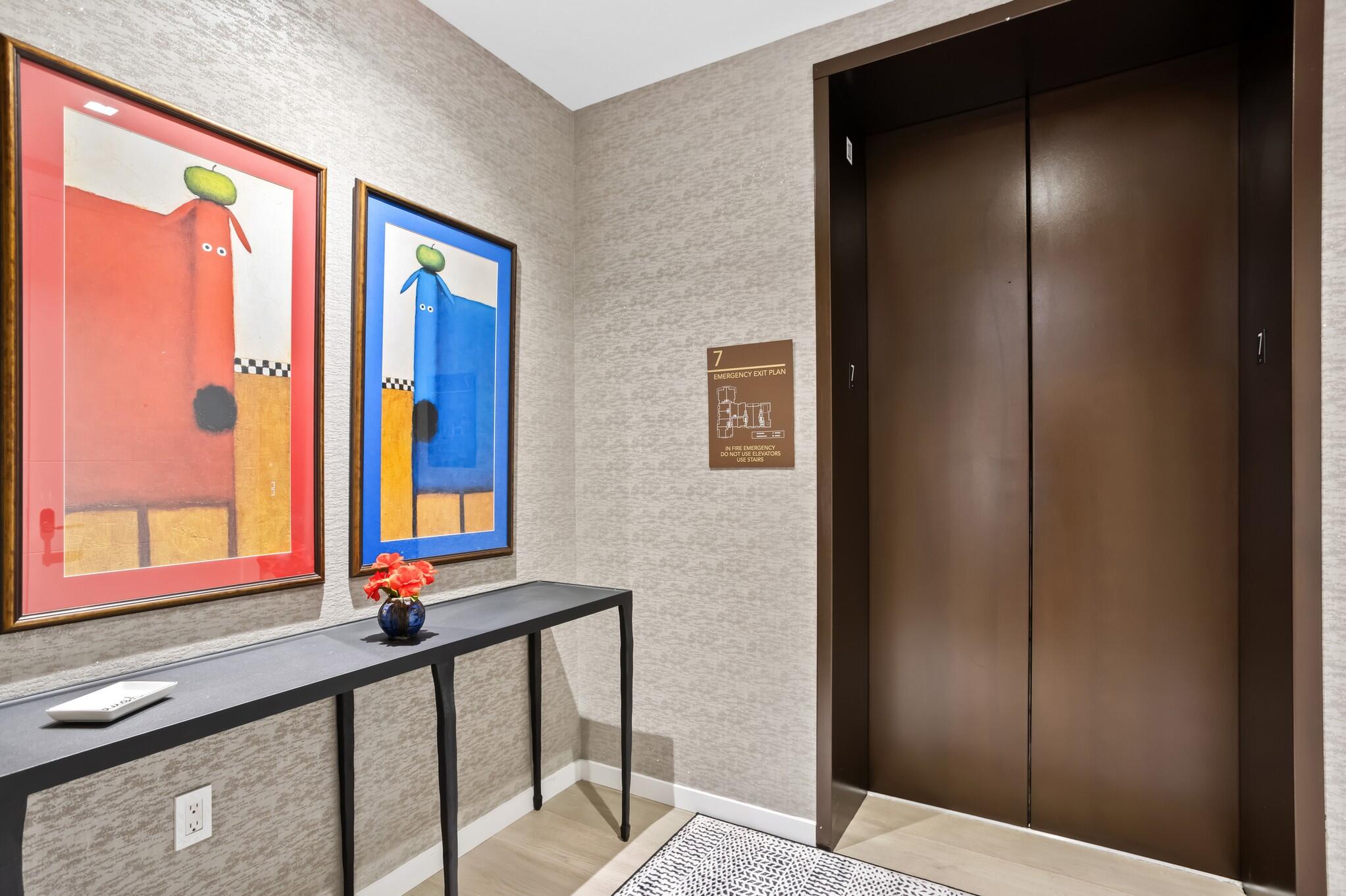 200 Southeast Mizner Boulevard, Unit 717 Boca Raton, FL 33432 - Photo 66 of 66 a view of a hallway with windows