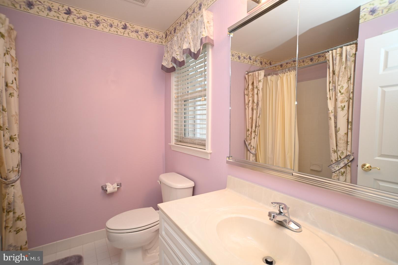 29 Ashley Drive Warminster, PA 18974 - Photo 28 of 44 a bathroom with a sink vanity mirror and toilet