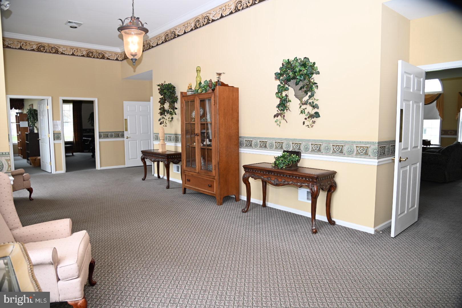 29 Ashley Drive Warminster, PA 18974 - Photo 34 of 44 a living room with furniture and a table