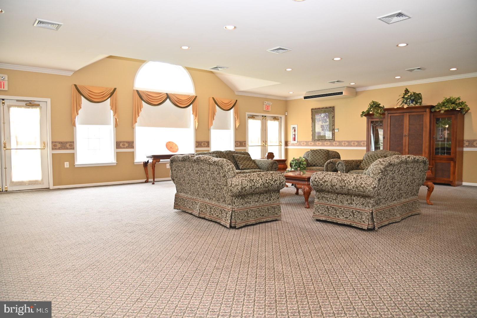 29 Ashley Drive Warminster, PA 18974 - Photo 40 of 44 a living room with furniture and a large window