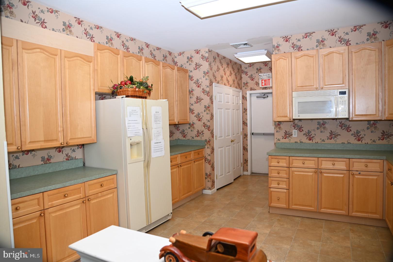 29 Ashley Drive Warminster, PA 18974 - Photo 41 of 44 a kitchen with stainless steel appliances a refrigerator sink and cabinets