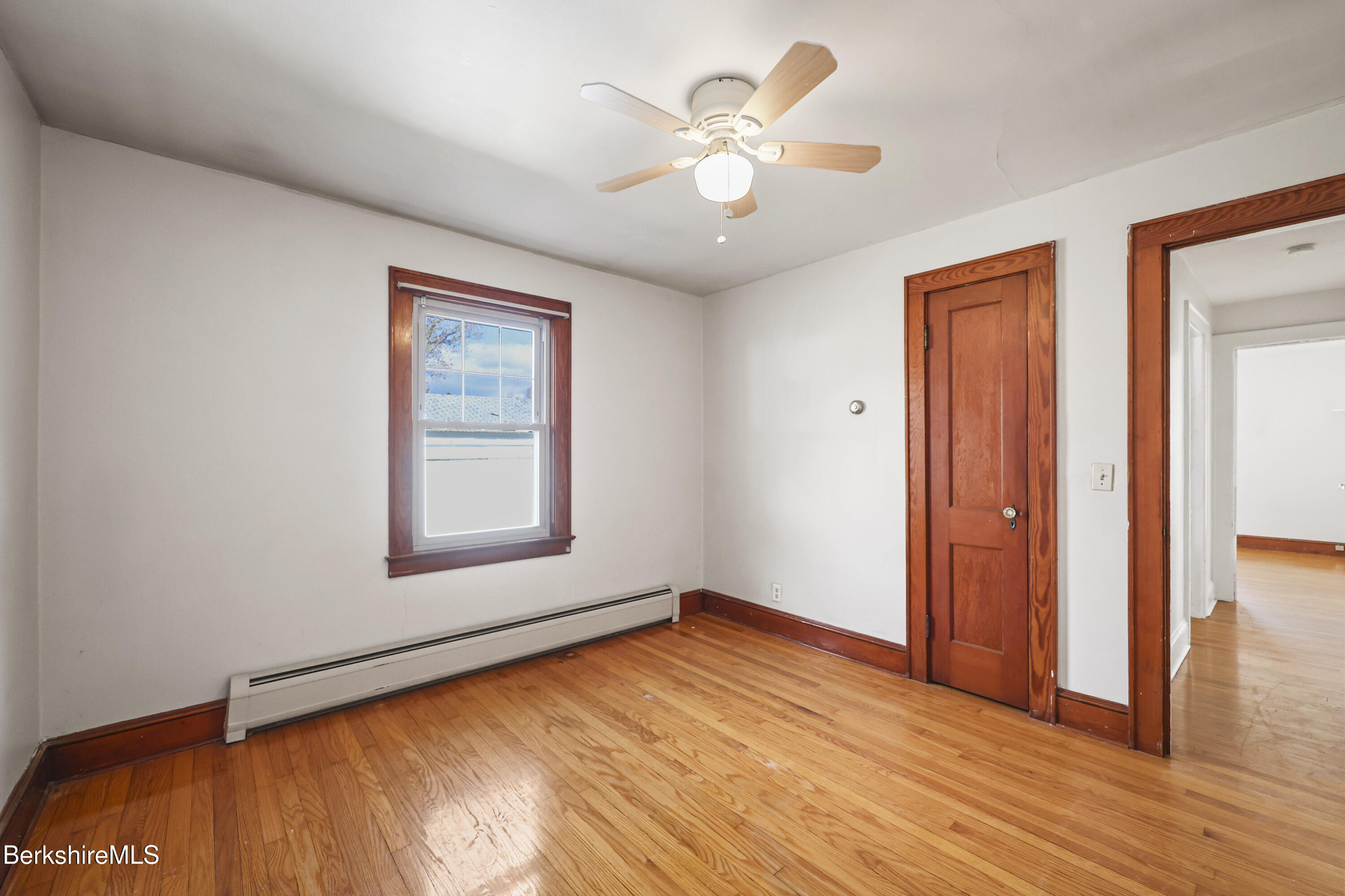 56 Tower Road Dalton, MA 01226 - Photo 15 of 24 wooden floor in an empty room with a window