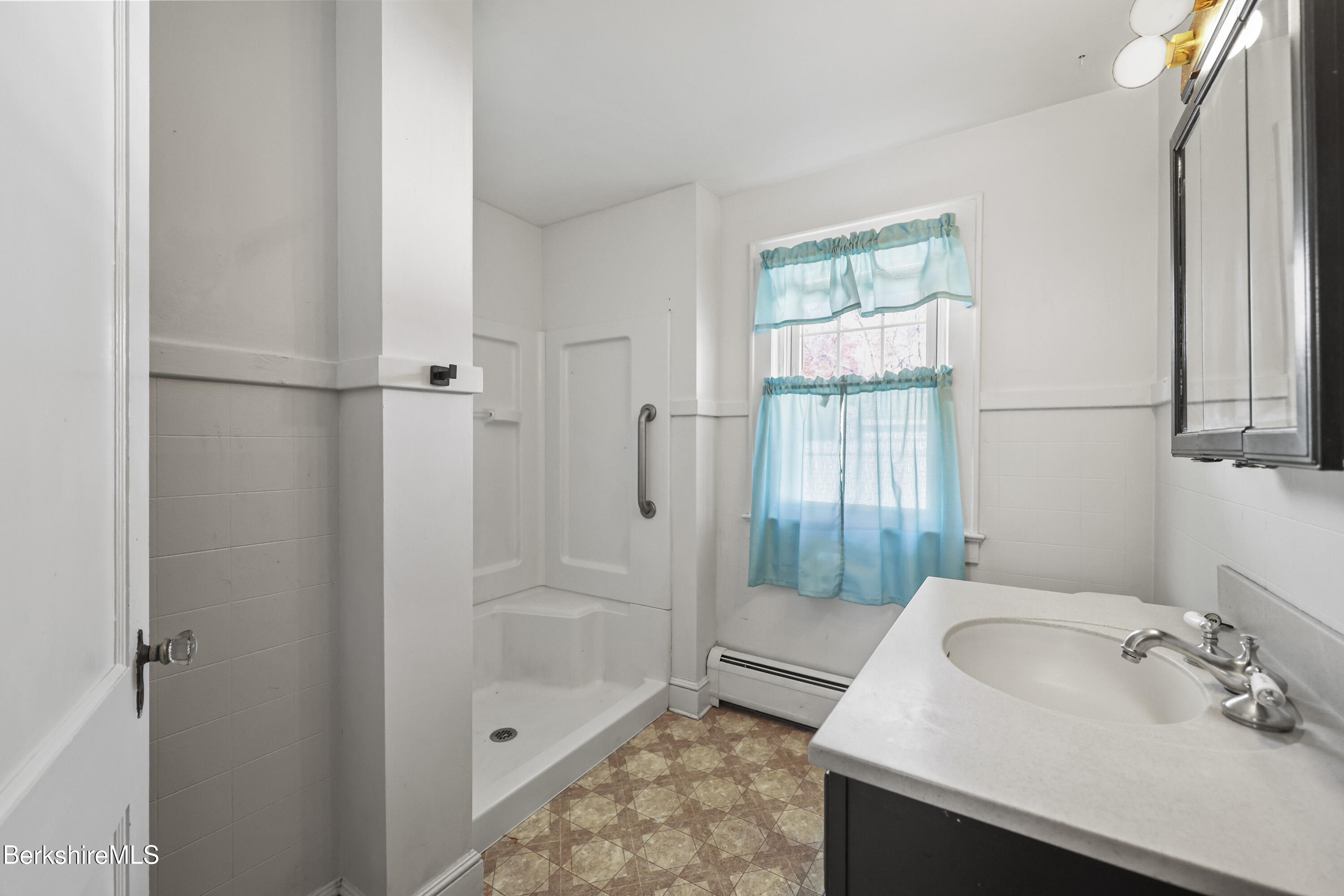 56 Tower Road Dalton, MA 01226 - Photo 16 of 24 a bathroom with a sink and a tub