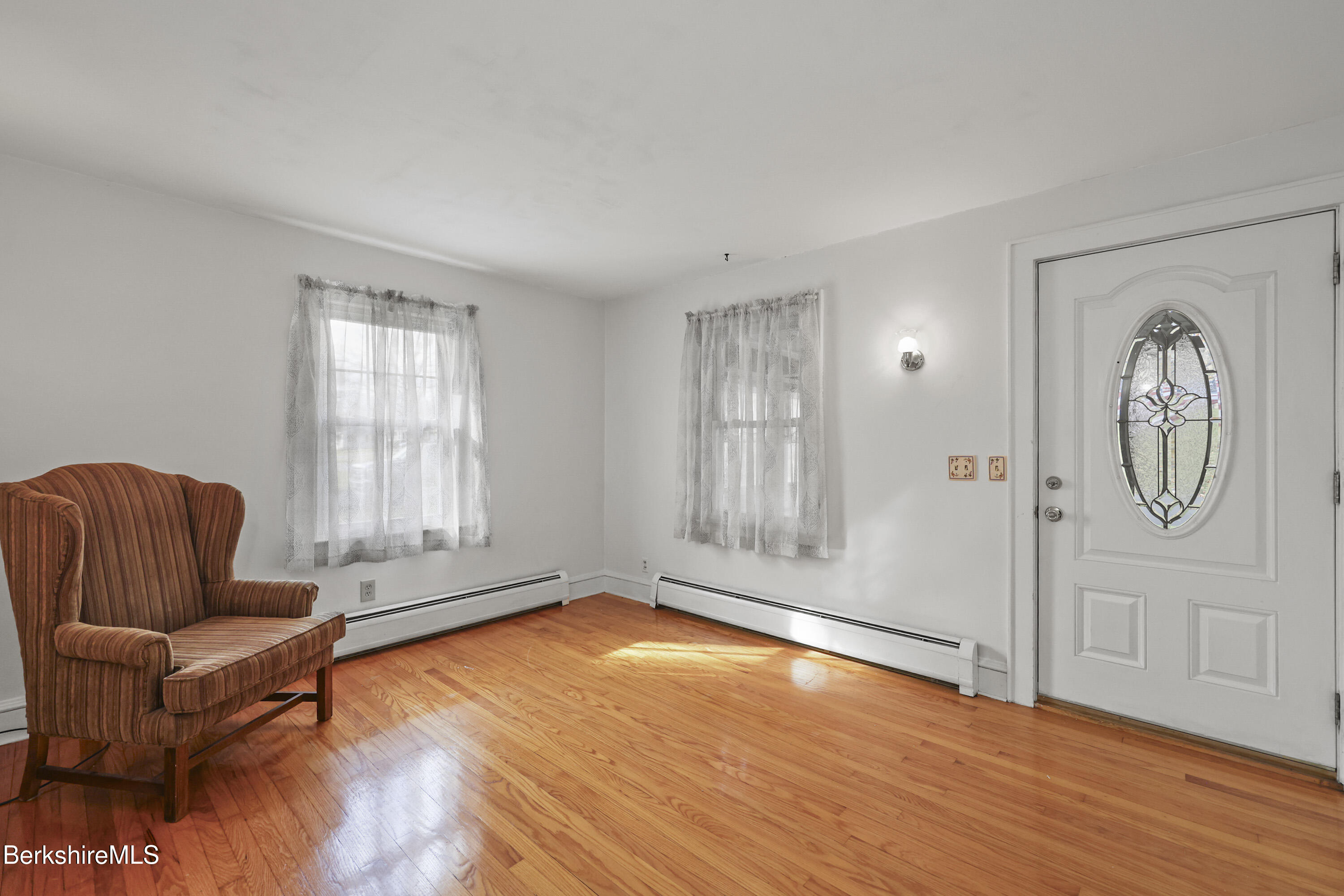 56 Tower Road Dalton, MA 01226 - Photo 4 of 24 a living room with furniture and a window