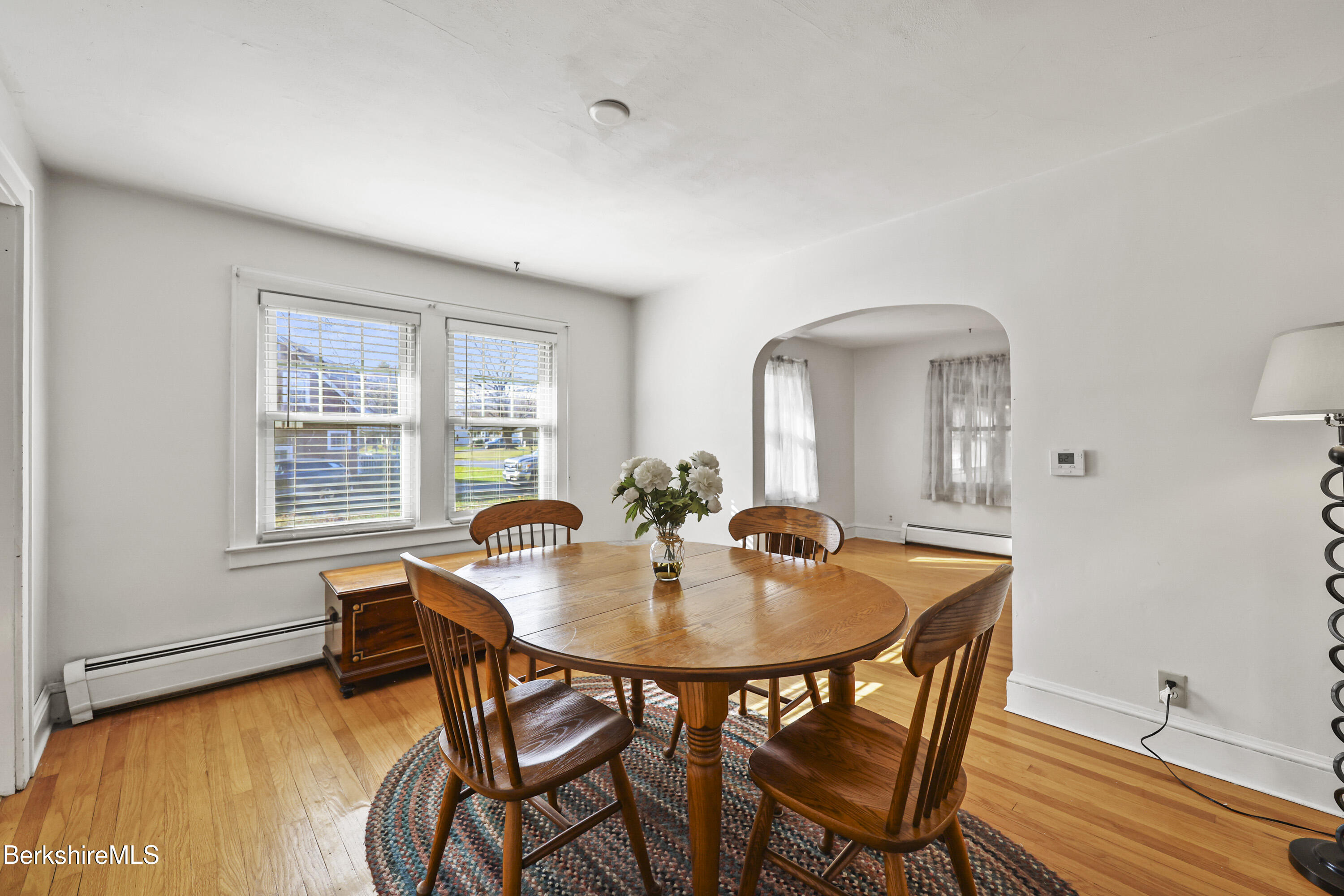 56 Tower Road Dalton, MA 01226 - Photo 7 of 24 a view of a dining room with furniture window and wooden floor