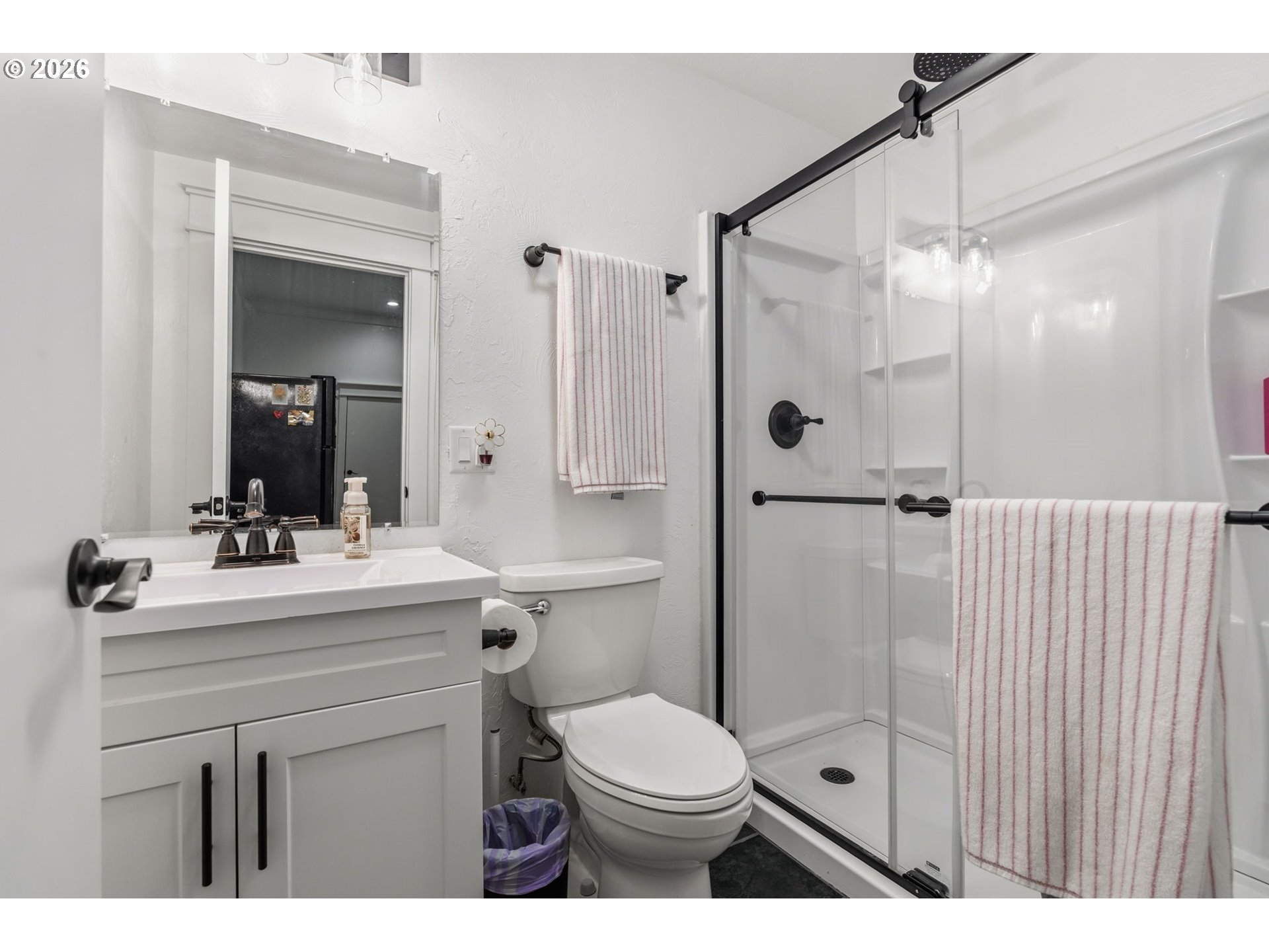 89093 Marcola Road Springfield, OR 97478 - Photo 10 of 25 a bathroom with a sink toilet vanity and shower