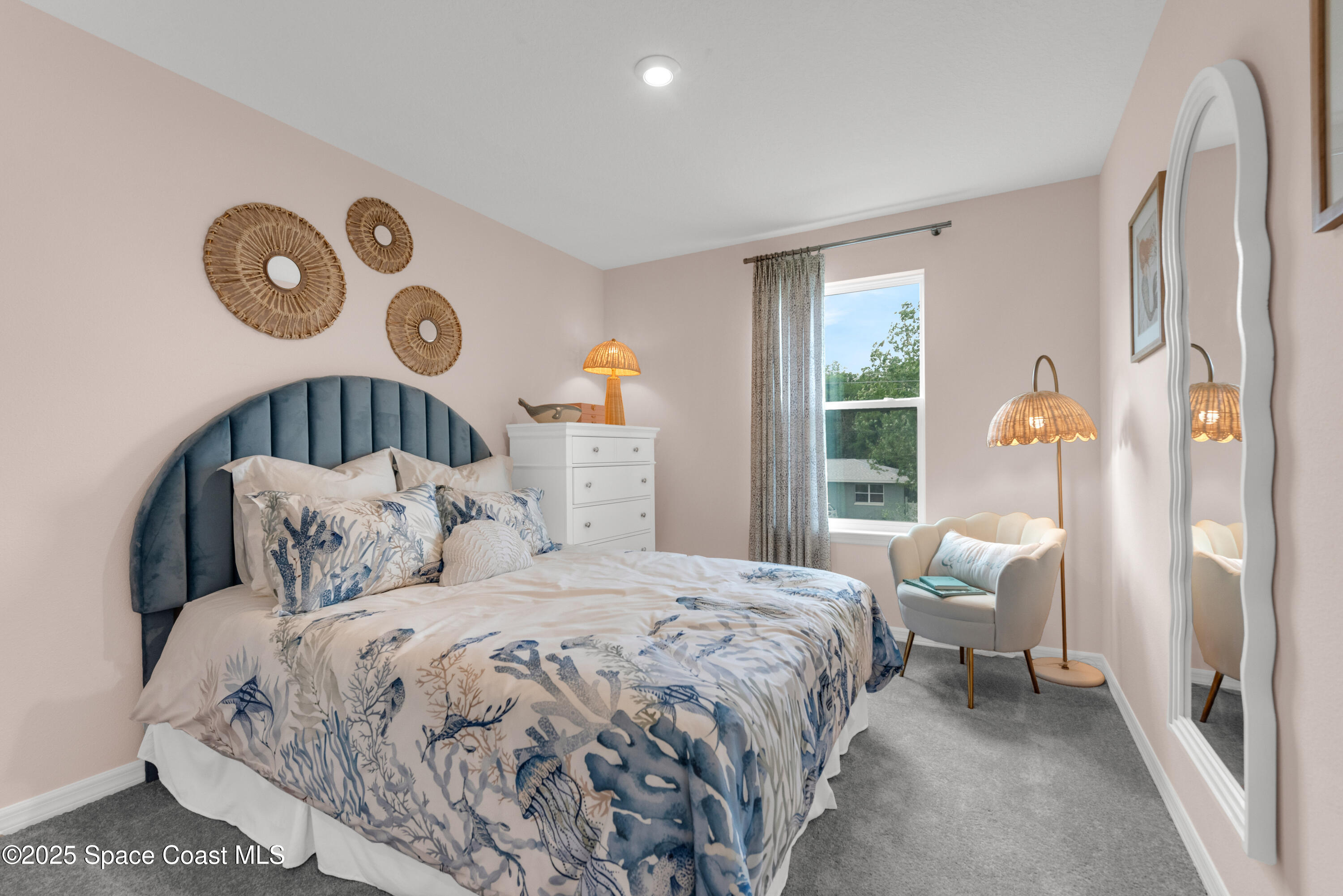 615 Poller Way Cocoa, FL 32927 - Photo 15 of 29 a bedroom with a bed and a window