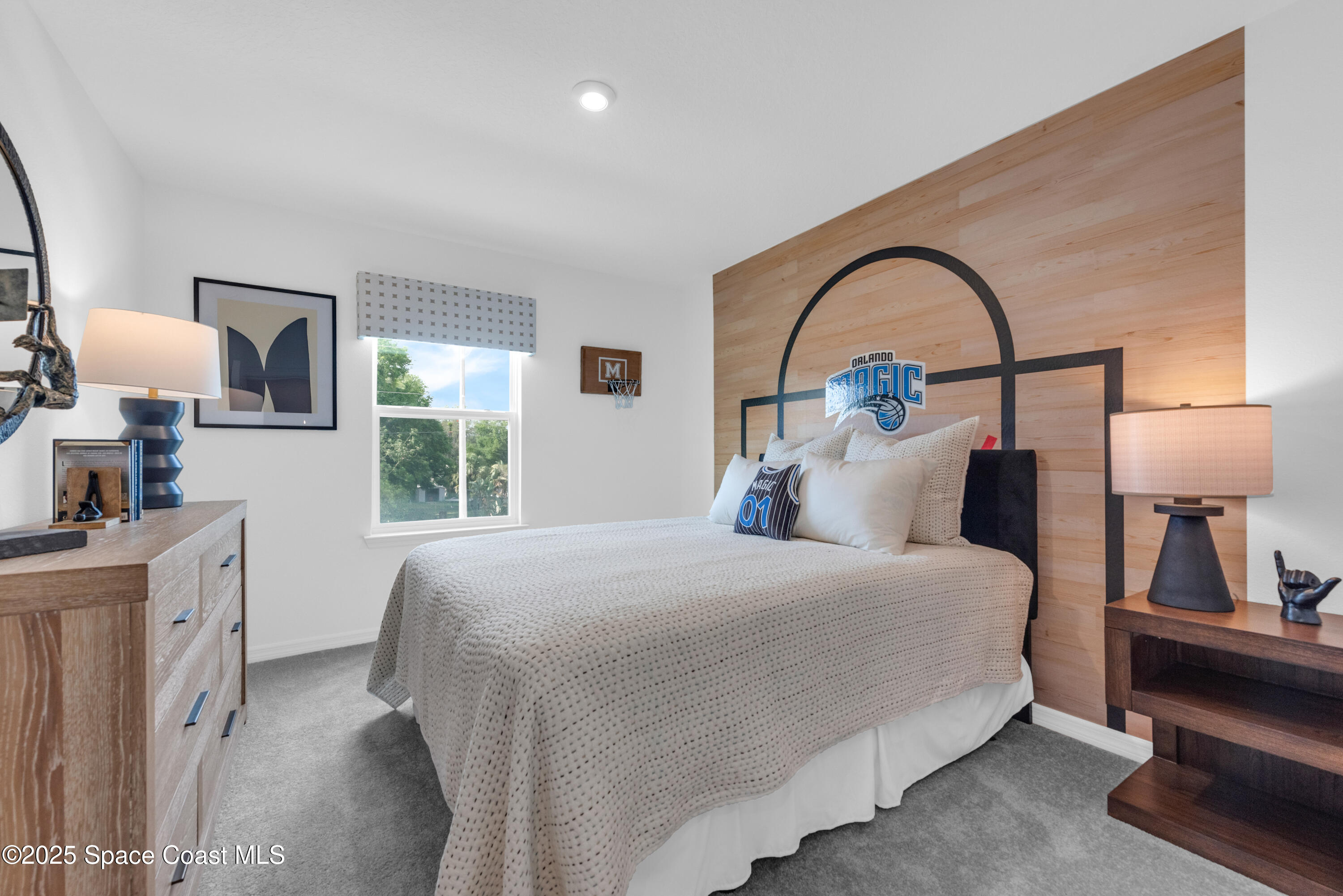 615 Poller Way Cocoa, FL 32927 - Photo 23 of 29 a bedroom with a bed and a lamp