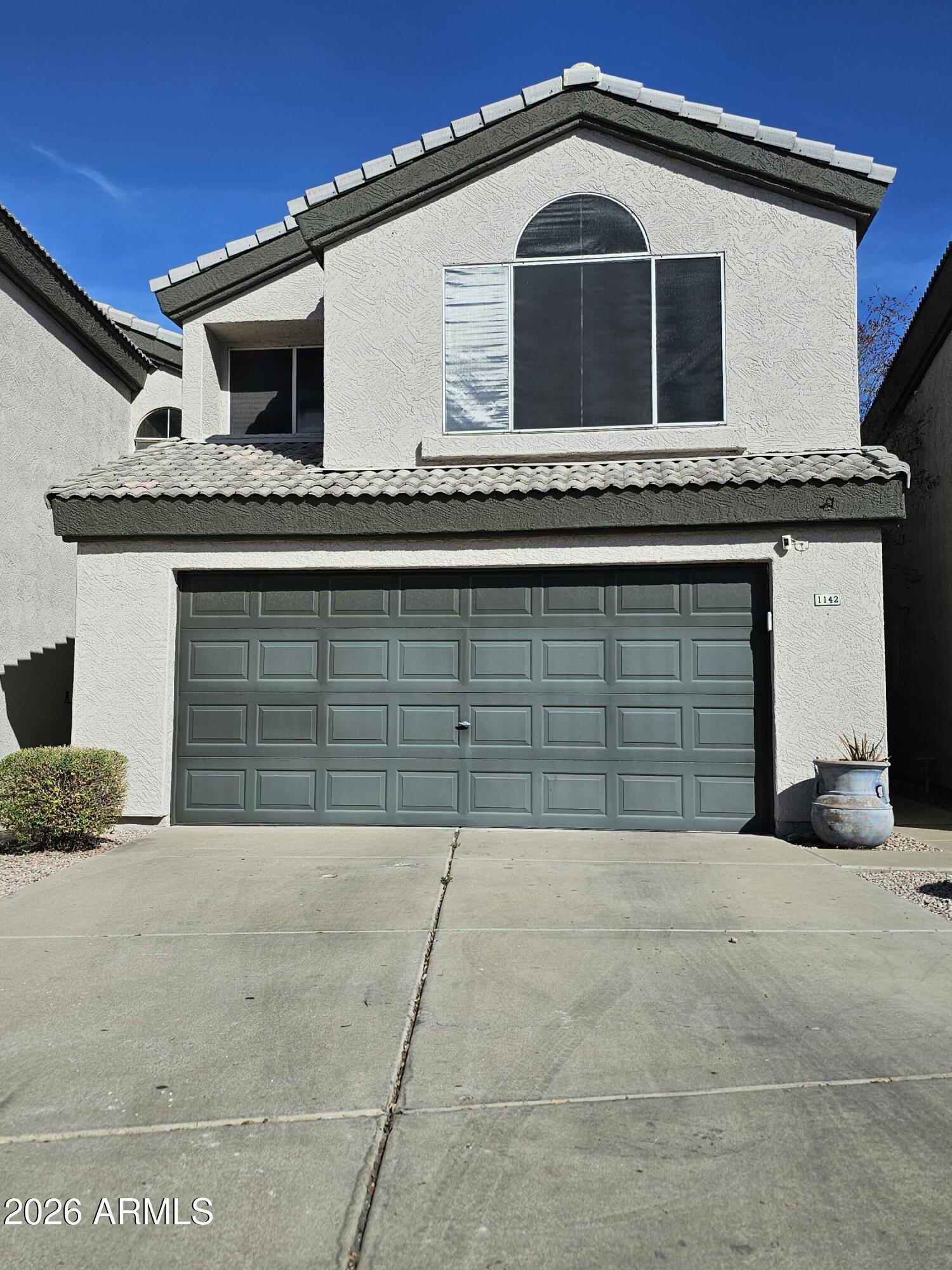 1142 West Sandy Banks Gilbert, AZ 85233 - Photo 2 of 20 1142 Front