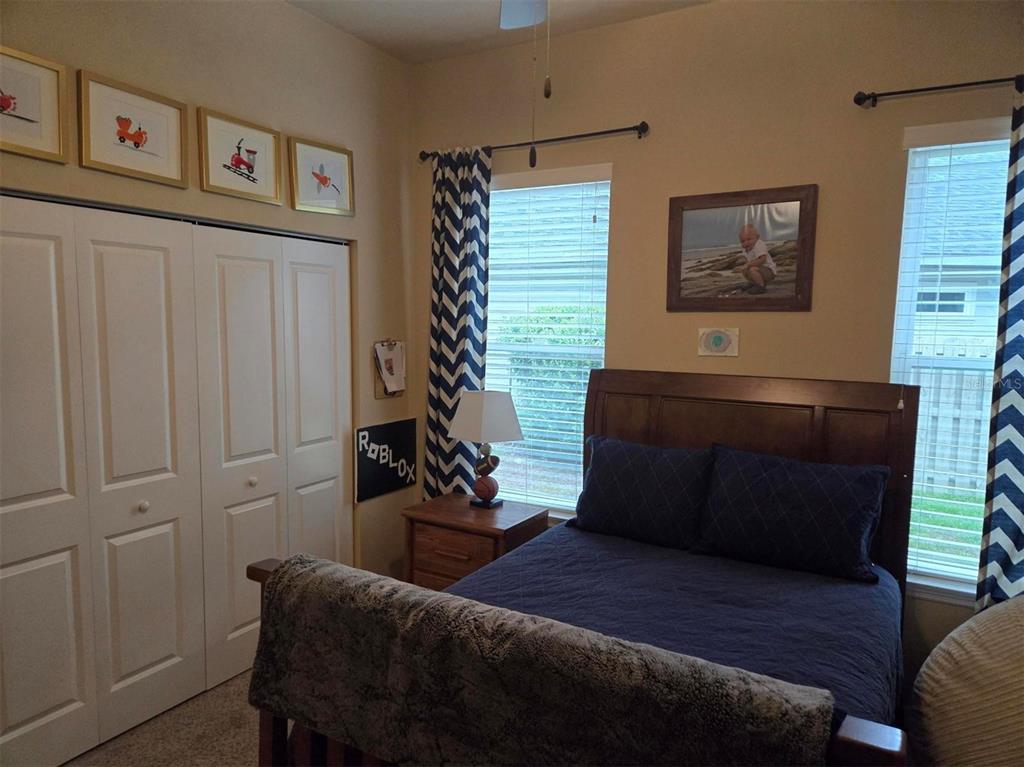 7971 Southwest 80th Lane Gainesville, FL 32608 - Photo 16 of 22 a living room with furniture and a window