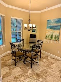7971 Southwest 80th Lane Gainesville, FL 32608 - Photo 6 of 22 a dining room with furniture and window