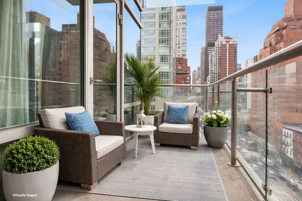 a view of a balcony with couches
