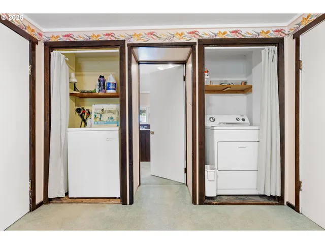 a bathroom with a sink vanity mirror and tub