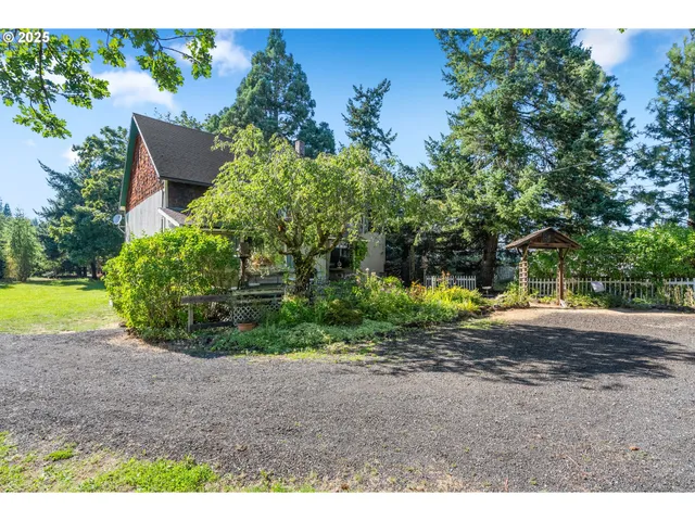 a view of a backyard with garden