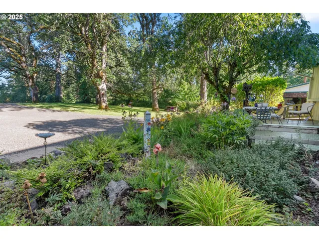 a aerial view of a house with a yard