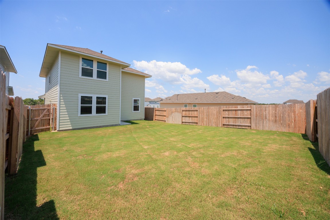 158 Linnet Lane Maxwell, TX 78656 - Photo 14 of 17 a view of a big yard with an outdoor space