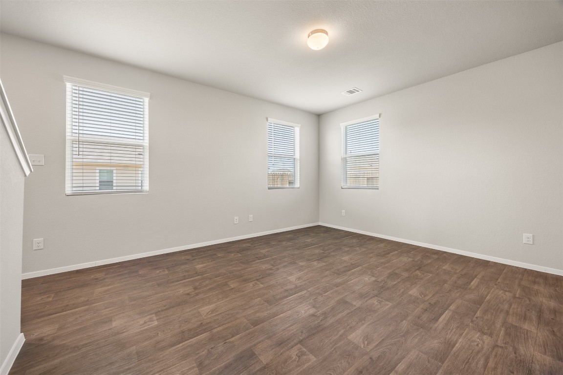 158 Linnet Lane Maxwell, TX 78656 - Photo 5 of 17 an empty room with windows