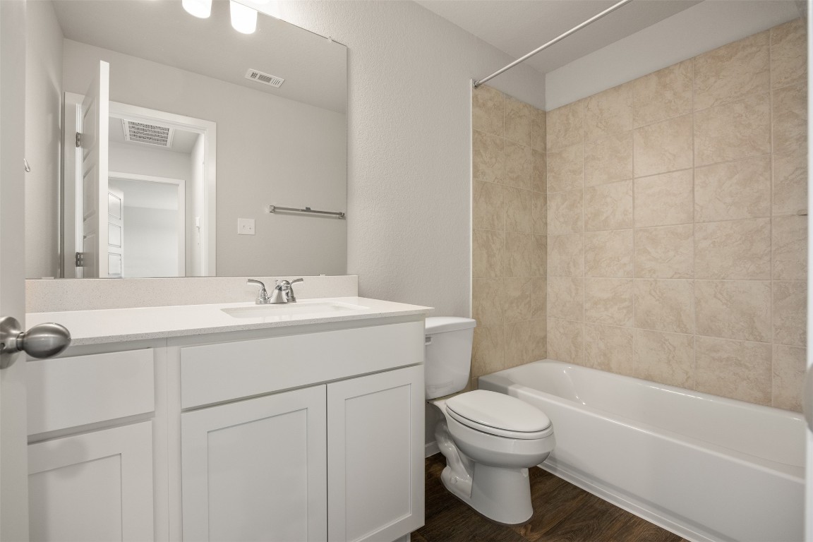 158 Linnet Lane Maxwell, TX 78656 - Photo 9 of 17 a bathroom with a sink a toilet and shower