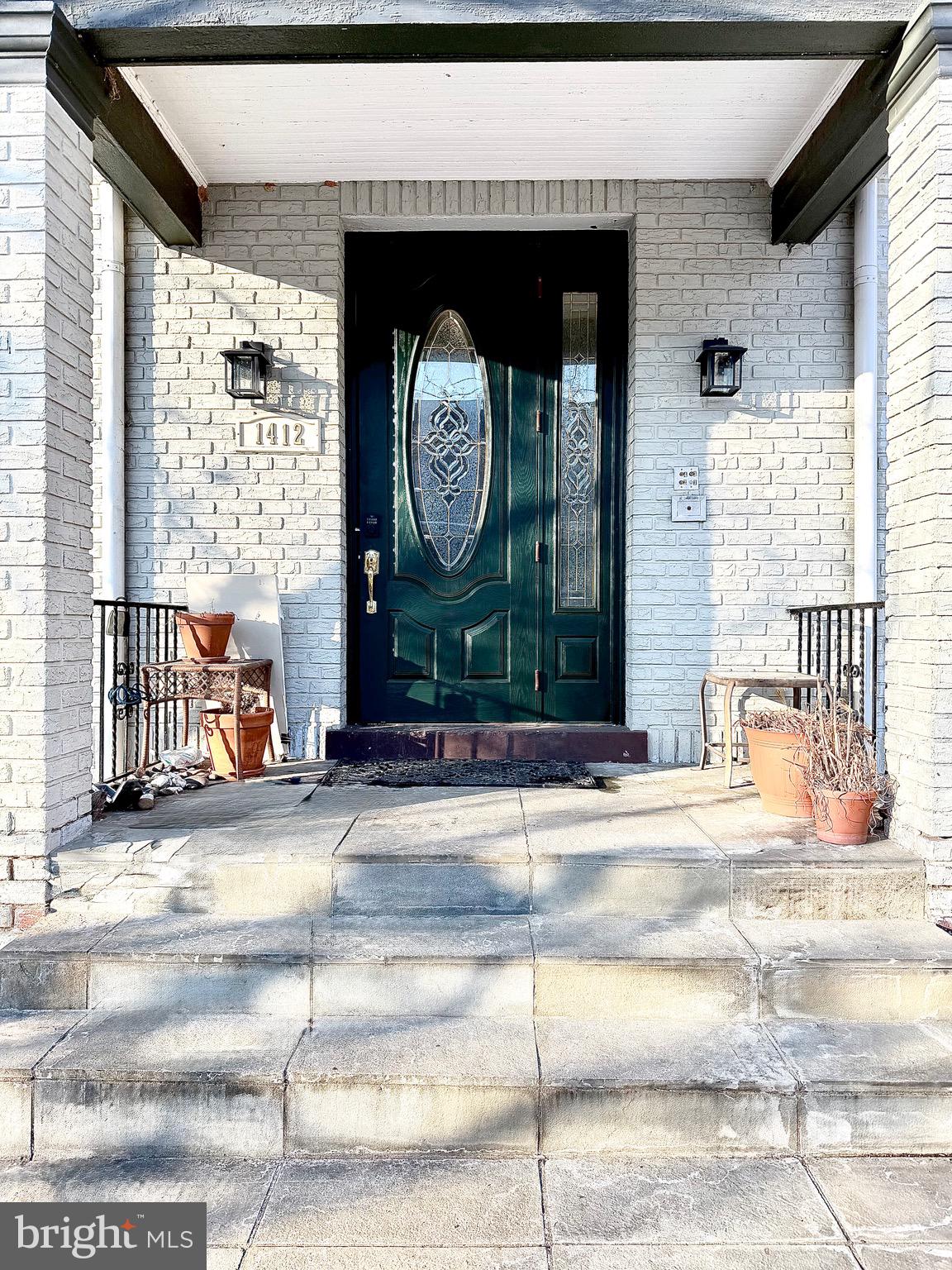 a view of a door front of a house