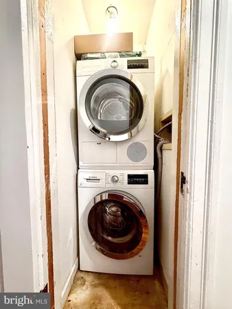 a view of a kitchen with washer and dryer