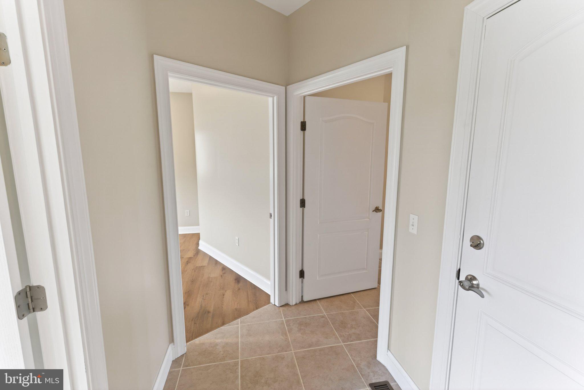 34029 Peppers Corner Road Millville, DE 19967 - Photo 25 of 101 Inviting entryway with modern design.