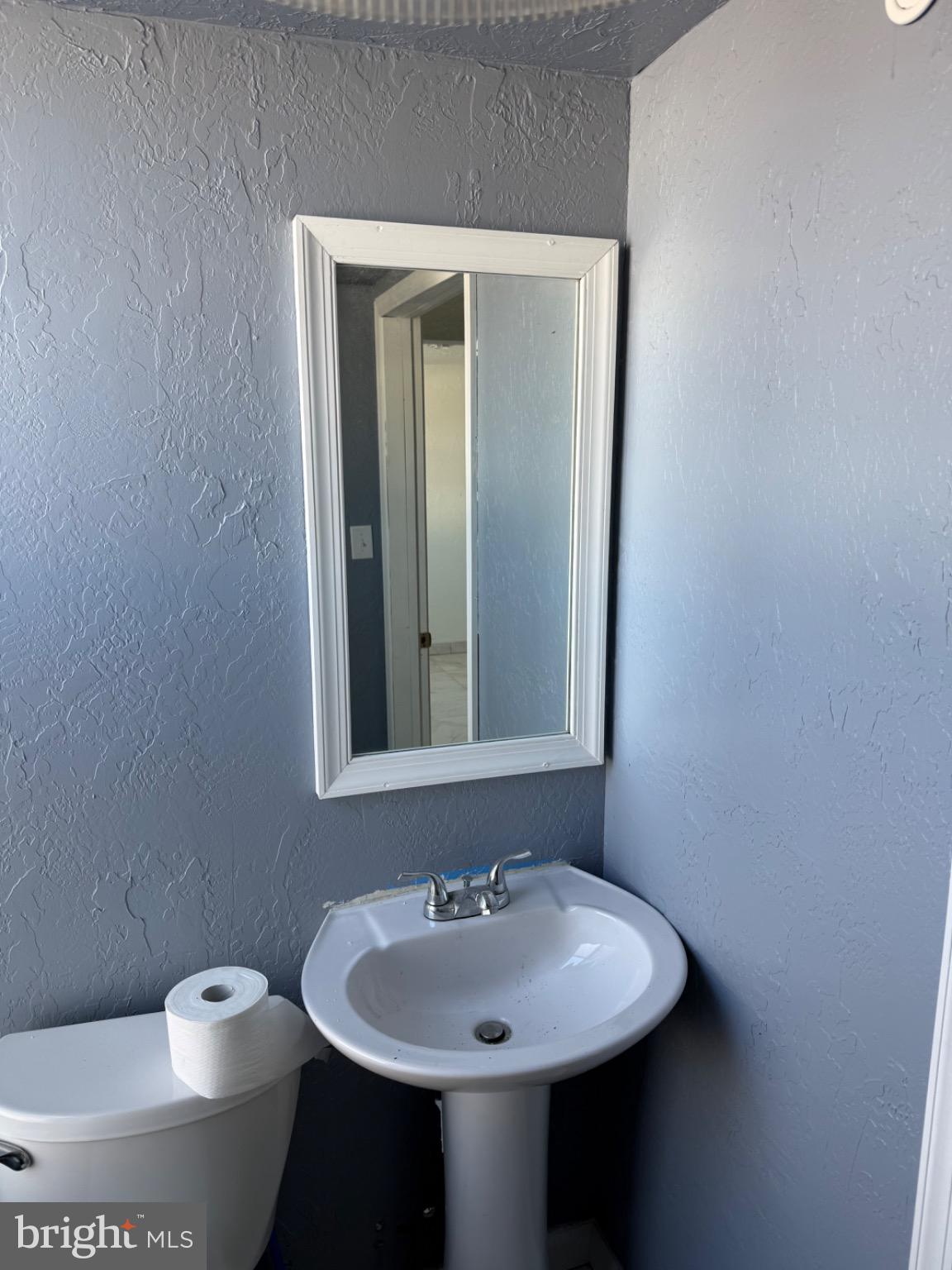 1880 West Market Street York, PA 17404 - Photo 19 of 57 a bathroom with a sink and a toilet