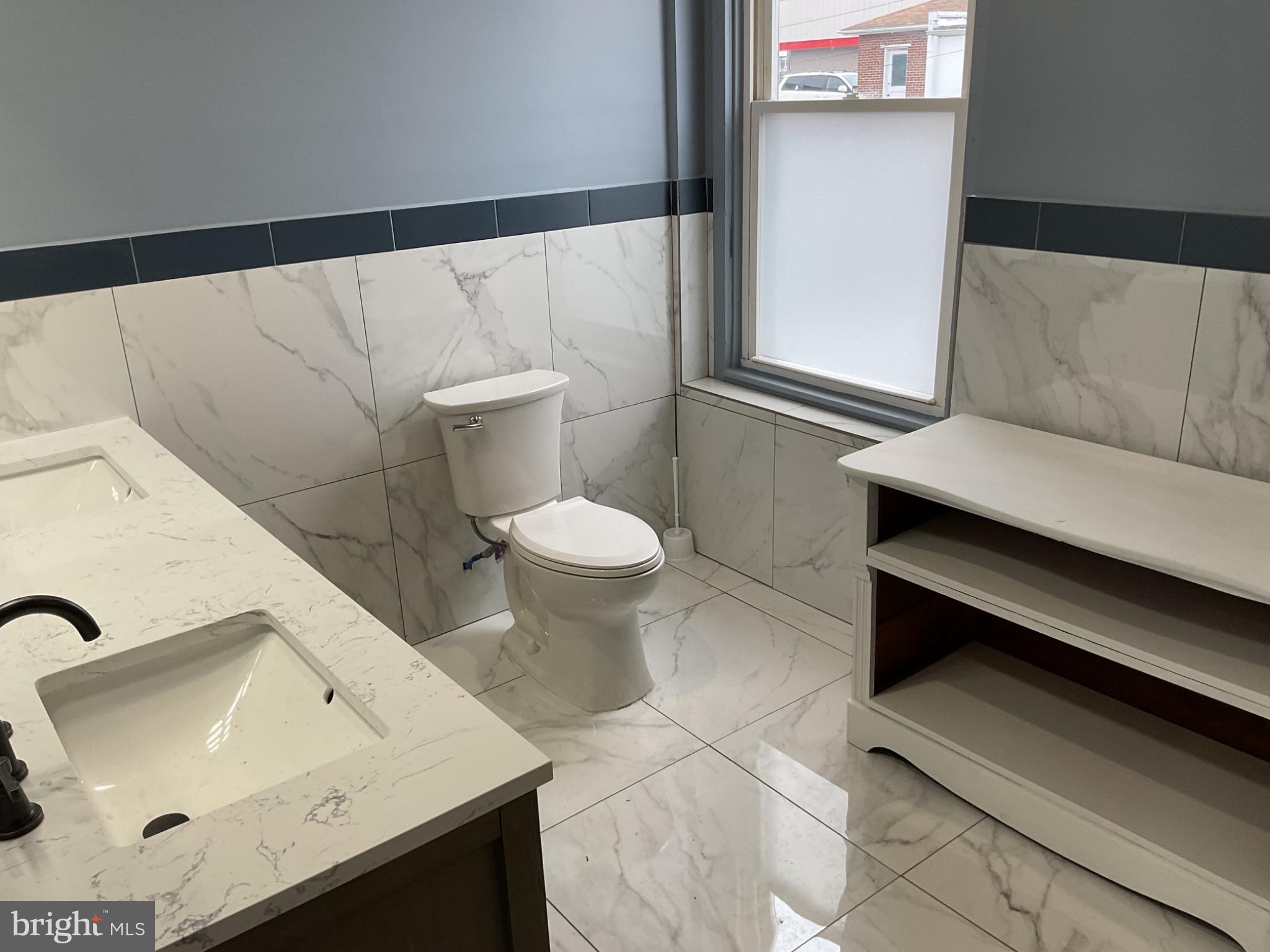 1880 West Market Street York, PA 17404 - Photo 33 of 57 a bathroom with a sink and a mirror