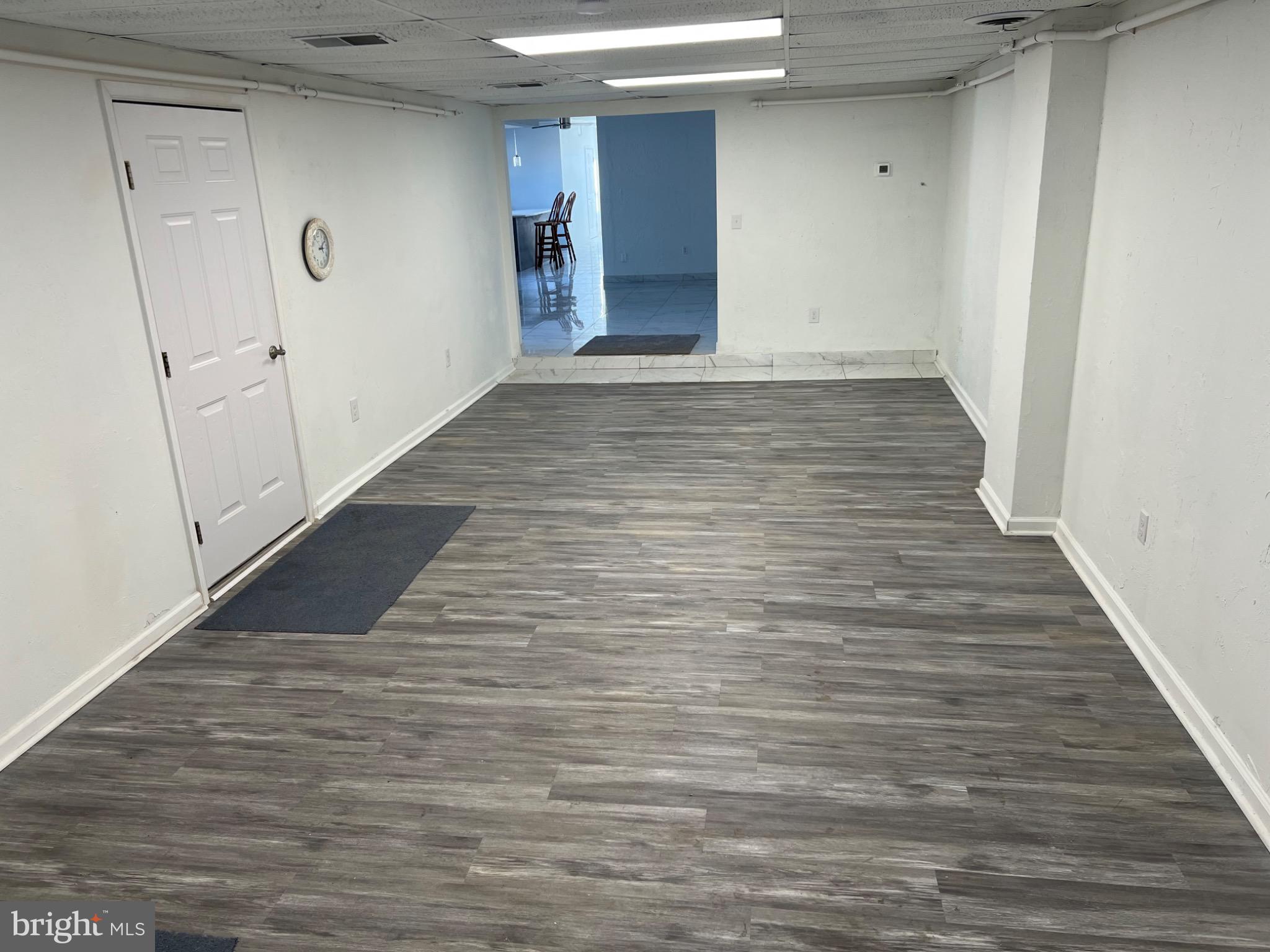 1880 West Market Street York, PA 17404 - Photo 9 of 57 a view of a hallway with wooden floor and staircase