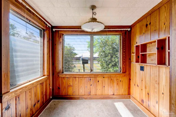 a view of a door and wooden floor