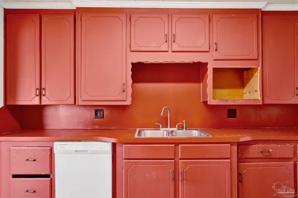 a kitchen with stainless steel appliances granite countertop cabinets and a sink