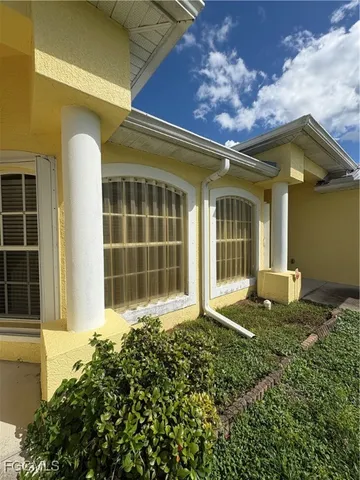 a house view with a garden space
