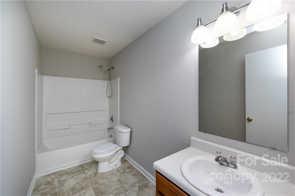 776 Ladino Lane Clover, SC 29710 - Photo 39 of 44 a bathroom with a sink a toilet and shower