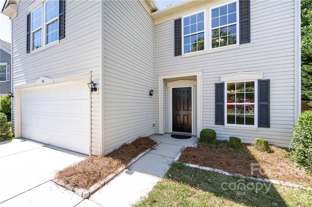 776 Ladino Lane Clover, SC 29710 - Photo 4 of 44 a front view of a house with a yard